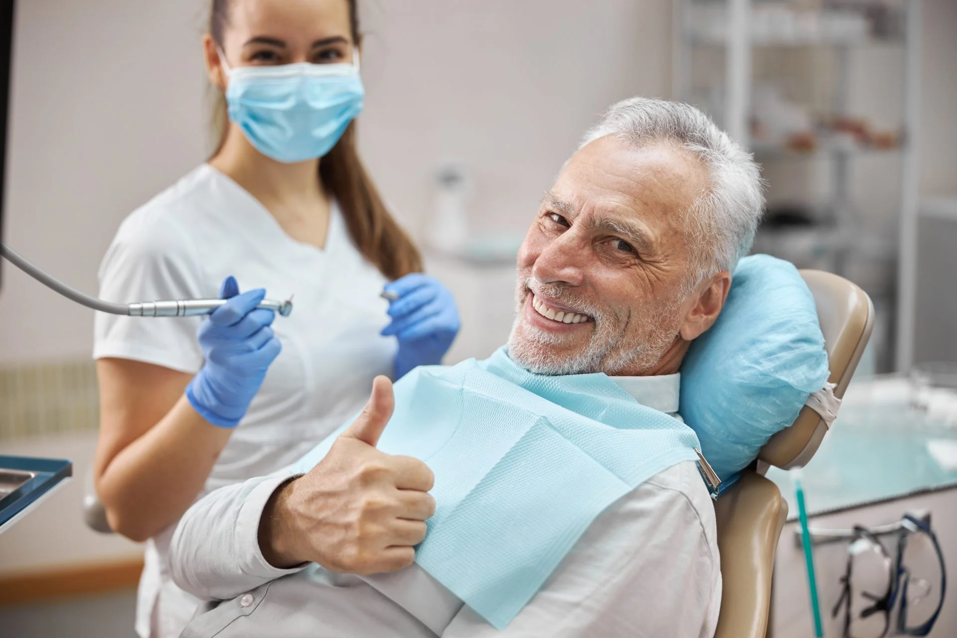 a man sitting in a dental chair